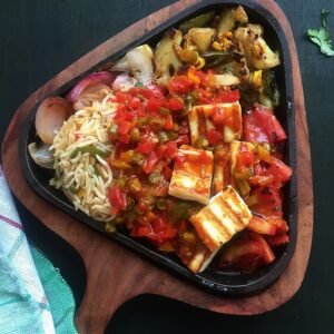 Paneer Sizzler(Paneer with Dry Potato & Flavaur rice)